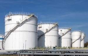 Oil storage tanks and pipes at the oil terminal