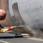 View of the sandblasting or abrasive blasting. Abrasive blasting
